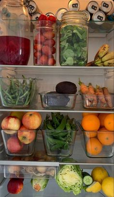 an open refrigerator filled with lots of different types of fruits and vegtables