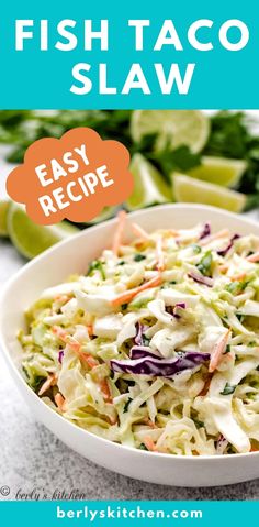 a white bowl filled with coleslaw and garnish next to limes