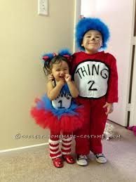 two children dressed up as dr seuss and thing 2