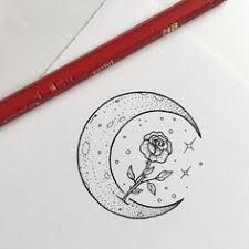 a drawing of a rose sitting on the moon with stars and dots around it, next to a red pencil