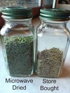 two glass jars filled with different types of herbs