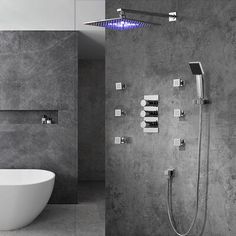 a bathroom with a tub and shower head