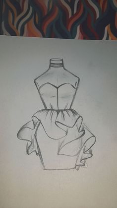 a drawing of a dress sitting on top of a table