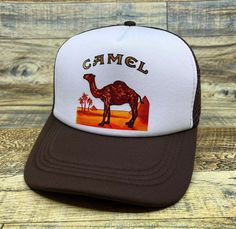 Camel Cigarette Mens Trucker Hat Brown Snapback Retro Vintage Logo Baseball Cap | eBay Retro Brown Trucker Hat With Flat Bill, Affordable Brown Vintage Trucker Hat, Brown Distressed Snapback Trucker Hat, Vintage Brown 5-panel Trucker Hat, Retro Brown 5-panel Snapback Hat, Mens Trucker Hat, Vintage Baseball Caps, Dad Caps, Vintage Logo