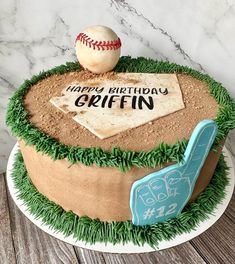 a baseball themed birthday cake on a table