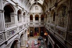 the interior of an old building with high ceilings