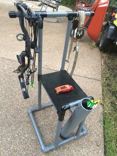 a bicycle rack with two bicycles attached to it