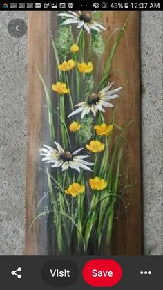 an image of flowers painted on a wooden plank