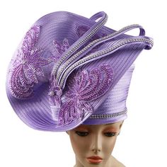 Introducing the exquisite 9001 Church Hat, an essential accessory for those who appreciate a blend of sophistication and tradition when assembling their Sunday outfit. With its eye-catching lavender hue, this hat is designed not only to complement a wide range of ensembles but also to stand out as a statement piece in its own right. Crafted with the utmost care, the hat boasts detailed floral accents that are carefully arranged to enhance its visual appeal. These embellishments are adorned with Adjustable Purple Costume Hats And Headpieces For Church, Adjustable Purple Costume Hats For Church, Purple Hat For Kentucky Derby, Purple Formal Hat For Kentucky Derby, Elegant Purple Top Hat For Kentucky Derby, Lavender Fitted Hat With Curved Brim, Elegant Purple Top Hat For Royal Ascot, Adjustable Purple Headpiece For Formal Events, Elegant Purple Top Hat For Races