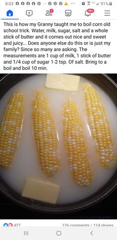 corn on the cob is being cooked in a skillet with butter and water