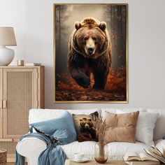 a brown bear is walking through the woods in front of a white couch with pillows on it