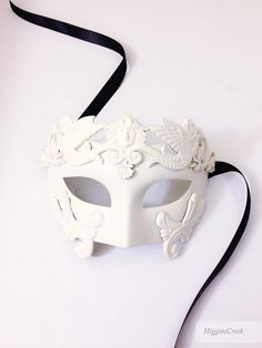 High quality Mask with embellishing is a great addition to any Masquerade Themed party or Mardi Gras. Colors can be customized. Choose custom color option and leave a checkout note with your ideas, we'll be in touch! S H I P P I N G - Processed same day or within 24 hours. 1-2 day guaranteed delivery services offered, add items to cart and click on shipping tab for rates. Pls leave a check out note with your need date & contact number (especially for expedited and custom orders) Msg for deli White Venetian Masquerade Mask For Wedding, White Formal Masquerade Mask For Carnival, White Venetian Masquerade Mask For Costume Party, White Venetian Mask For Costume Party, Venetian White Mask For Costume Party, Masquerade Themed Party, Masquerade Masks For Men, Mens Mask, Wedding Masquerade