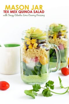 two mason jars filled with different types of food