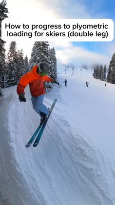 a man flying through the air while riding skis on top of snow covered ground