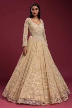 Cream evening gown, V-neck evening gown, Beaded evening gown, Net evening gown, Embroidered evening gown, Gown for Women, Gowns, Gown Design, Bridal Gown, Party Wear Gown Golden Gown Indian, Gold Anarkali Gown, Luxury Bollywood Gown With Gold Embroidery, Gold Dabka Floor-length Lehenga, Gold Bollywood Organza Gown, Net Gown Designs, Net Gowns