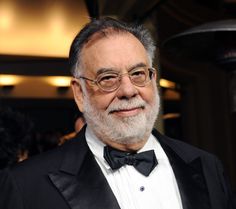 an older man in a tuxedo and bow tie