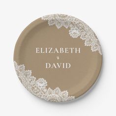 a paper plate with the words elizabeth and david written on it in white laces