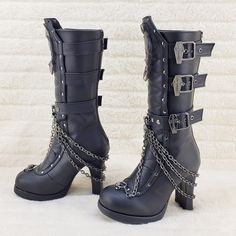 4" (102mm) Block Heel, 3/4" (19mm) Platform Mid-Calf Boot W/ Coffin Buckle Straps, Skull Patch & Lace Embellished Quilted Front Panel W/ Studs & Swivel Hook Cascading Chain Detail, Metal Back Zip Closure New In Box Authentic Demonia Demonia Boots, Gothic Boots, Skull Patch, Demonia Shoes, Swivel Hook, Platform Heels Boots, Black Platform Boots, Leather Heeled Boots, Girly Shoes