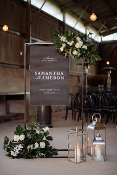 a sign that says samantha and cameron on it next to some flowers