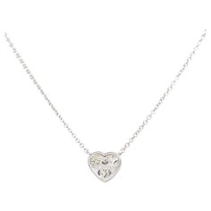 GIA 18k White Gold Natural 1.01 Carat Heart Shape Diamond Floating Necklace Calling all the heart-shape lovers out there! A beautiful and timeless design, that all women love! This piece can be worn by itself, or added to your favorites as a layering piece. Product: Natural Heart Shape Diamond Floating Necklace Material: 18k White Gold Chain GIA Diamond Details: The Gemological Institute of America (GIA) has graded the main diamond. The diamond's certificate number is 1338361460. The heart-shape Floating Necklace, White Gold Chain, Heart Shaped Diamond, Gia Diamond, Link Necklace, Diamond Clarity, Layering Pieces, Tiffany & Co., Karate