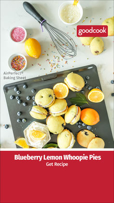 blueberry lemon whoopie pies on a baking sheet with ingredients around them