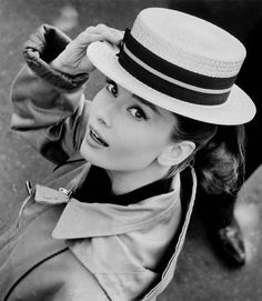 black and white photograph of woman in hat