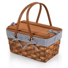 a wooden basket with blue and white striped fabric on the handle, isolated on a white background