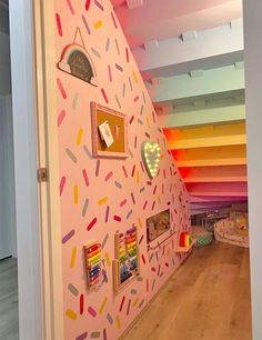 the wall is decorated with colorful sprinkles and pictures on it's sides