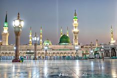 an image of the inside of a mosque at night