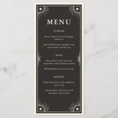 a black and white menu card with an art deco design