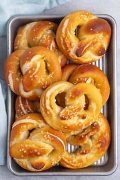 freshly baked pretzels in a baking tin