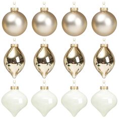 a set of six christmas ornaments in gold and white