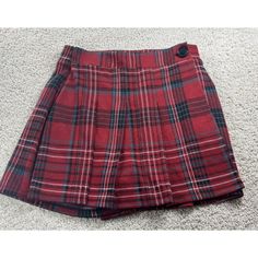 Hollister Red Ultra High-Rise Mini Skort Size Small Pleated Plaid. New With Tags ***Has 3 Small Holes On The Back Please See The Picture*** Size Small Junior Width Waist 13 Inches Lying Flat Length 14 Inches From Top To Bottom Short Rise 3 Inches Color Red, Gray, And White New With Tags Hollister Shorts, Picture Size, Picture Sizes, Hollister, Red Color, Mini Skirt, High Rise, Black And Red, Mini Skirts