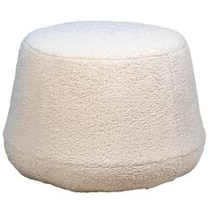 a large white ottoman sitting on top of a floor