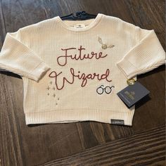 Brand New With Tags Attached Unisex Toddler Sized 3t “Future Wizard” Sweater Colored Cream. Sold Out Online! Harry Potter Kids, Unisex Sweater, Toddler Sizes, Kids Tops, Colorful Sweaters, Wizard, Kids Shirts, Baby Stuff, Sweater Top