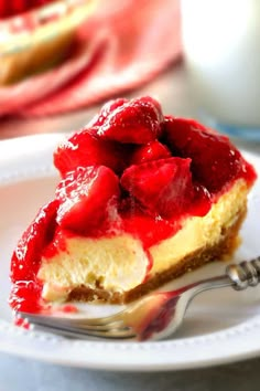 a slice of cheesecake with strawberries on top