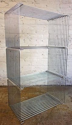 Chrome Bedroom Decor, Wire Nightstand, Montana Shelves, Chrome Living Room, Living Room Mid Century Modern, Wire Furniture, Chrome Decor, Mid Century Room, Wire Table