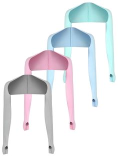 three different colored chairs sitting next to each other