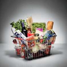 a shopping basket filled with food and drinks