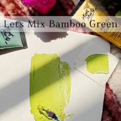 green paint is being used to make an art project