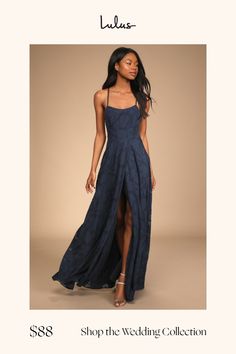 a woman in a long blue dress with the words shop the wedding collection on it