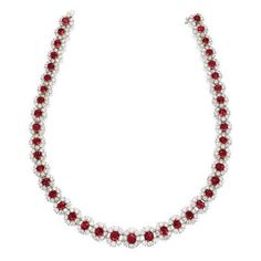 METAL SPECIFICATIONS Metal Name: White Gold 14K STONE SPECIFICATIONS Stone Name: RUBY /DIAMOND Stone Cut : Oval and Round cut Stone Specifications: There are total rubies of approx. 20.00 carats & approx. 8.50 carats of smaller round diamonds on the side. Natural earth mined stones. Total Stone Weight : approx. 28.50 carats Color : Red/G Clarity : AAA/SI NECKLACE SPECIFICATIONS Length : 16” (Can change length, please indicate about change with payment) Appraised Value : $37500. 00 Comes with Ruby Jewellery, Ruby And Diamond Necklace, Journey Pendant, Ladies Necklace, Colour Stone, Earring Trends, Diamond Necklaces, Ruby Necklace, Ruby Jewelry