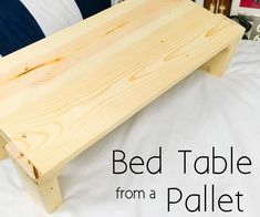 a bed table made from a pallet is shown with the text overlay that reads, bed table from a pallet