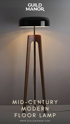 the mid century modern floor lamp is shown in front of a gray background with white lettering