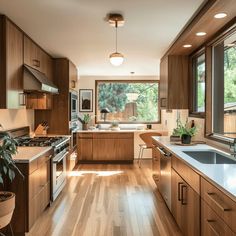 a kitchen with wooden cabinets and white counter tops next to a large window that looks out onto the woods