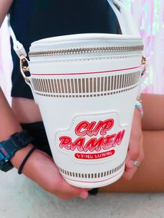 Cup ramen fans unite! This is the perfect gift for the noodle-lovin' friend or best complement for that Halloween costume. Whatever the occasion may be, this bag will stir up conversations! High quality stitching and screenprinting Cylindrical shape Adjustable and detachable strap Dimensions: 5.50"L x 5.50"W x 6.75"H Item #3443 Cup Of Ramen, Real Ramen, Cup Ramen, Ramen Noodle Soup, Unique Tote Bag, Ramen Noodle