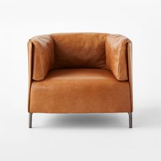 a brown leather chair on a white background