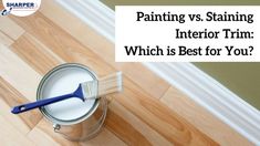 a paint can with a brush in it and the words painting vs staining interior trim which is best for you?