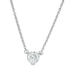 Unmatched in style, this diamond necklace from the Zales Private Collection redefines classic. Fashioned in 14K white gold, this superb choice showcases a sparkling 1/3 ct. certified colorless diamond solitaire boasting a color rank of F and clarity of I1. A signature "Z"-shaped design gleams along the setting. Polished to a bright shine, this look suspends centered along an 18.0-inch cable chain that secures with a lobster claw clasp. This piece comes with a certificate that includes a photo an Solitaire Necklace, Diamond Solitaire Necklace, Colorless Diamond, Solitaire Necklaces, Art Deco Inspired, White Metal, Diamond Stone, Diamond Clarity, Bridal Rings