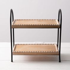 three tiered wooden shelf with metal handles